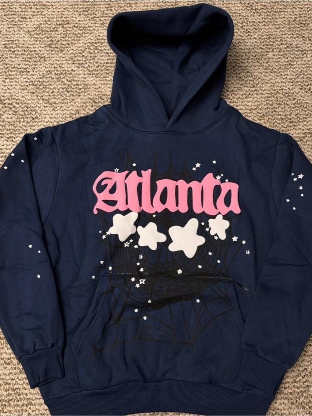 Navy blue Sp5der hoodie with wording "Atlanta"